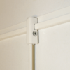 Anti-theft cap for J-rail hanging rod